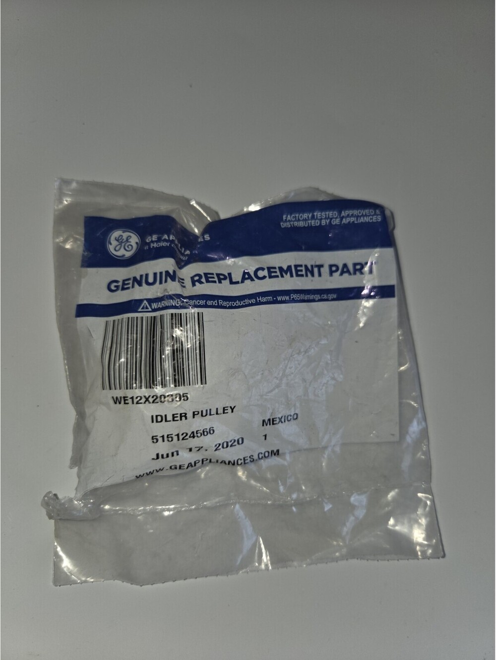 Brand New  Genuine OEM GE Dryer idler Pulley WE12X20395 A23